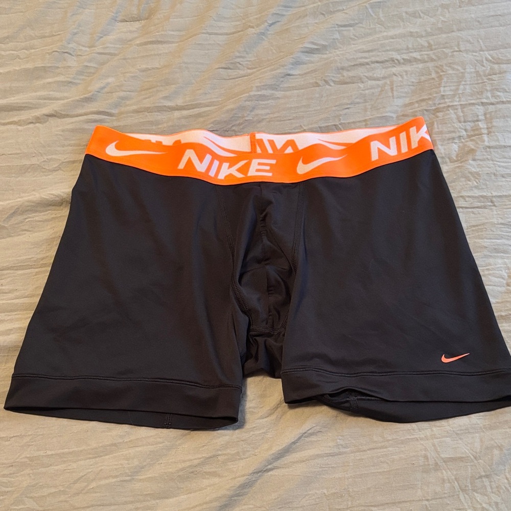 Nike spandex in Black with Orange Waistband